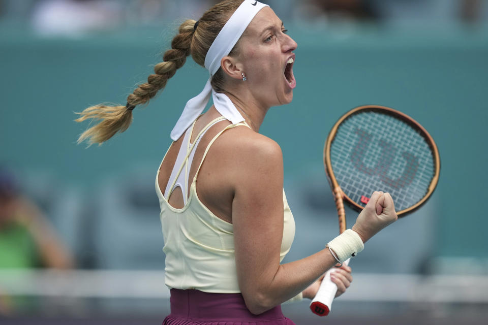 Petra Kvitova, of the Czech Republic, celebrates winning a point against Sorana Cirstea, of Romania, during a semifinal at the Miami Open tennis tournament Friday, March 31, 2023, in Miami Gardens, Fla. (AP Photo/Jim Rassol)