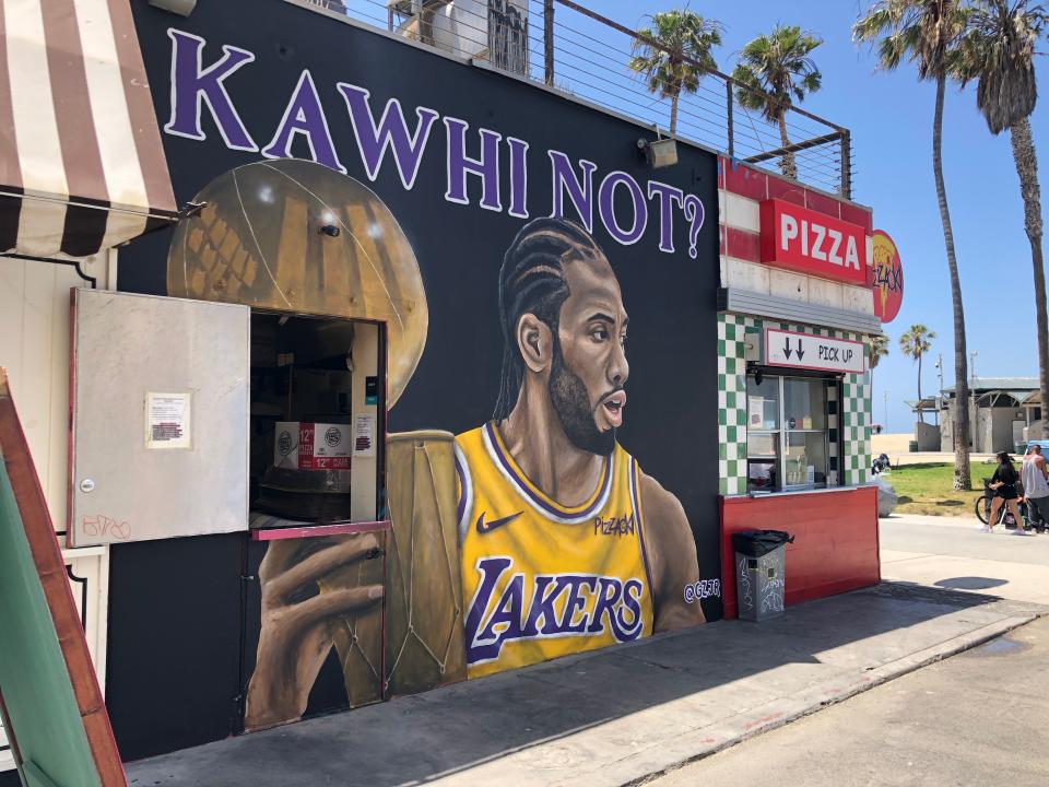 The work of Los Angeles muralist Gustavo Zermeño Jr. has caught the attention of basketball fans the last two summers. (Alanis Thames/Yahoo Sports)