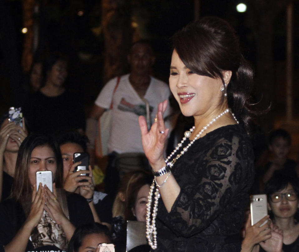 In this Oct 27, 2017, photo, Thai Princess Ubolratana Mahidol waves to Thai people outside Grand Palace in Bangkok , Thailand. The selection of the elder sister of Thailand’s king as a political party nominee for prime minister has upended a tradition of the palace playing no public role in politics. Most but not all modern monarchies steer clear of direct involvement in electoral politics or governing. (AP Photo)