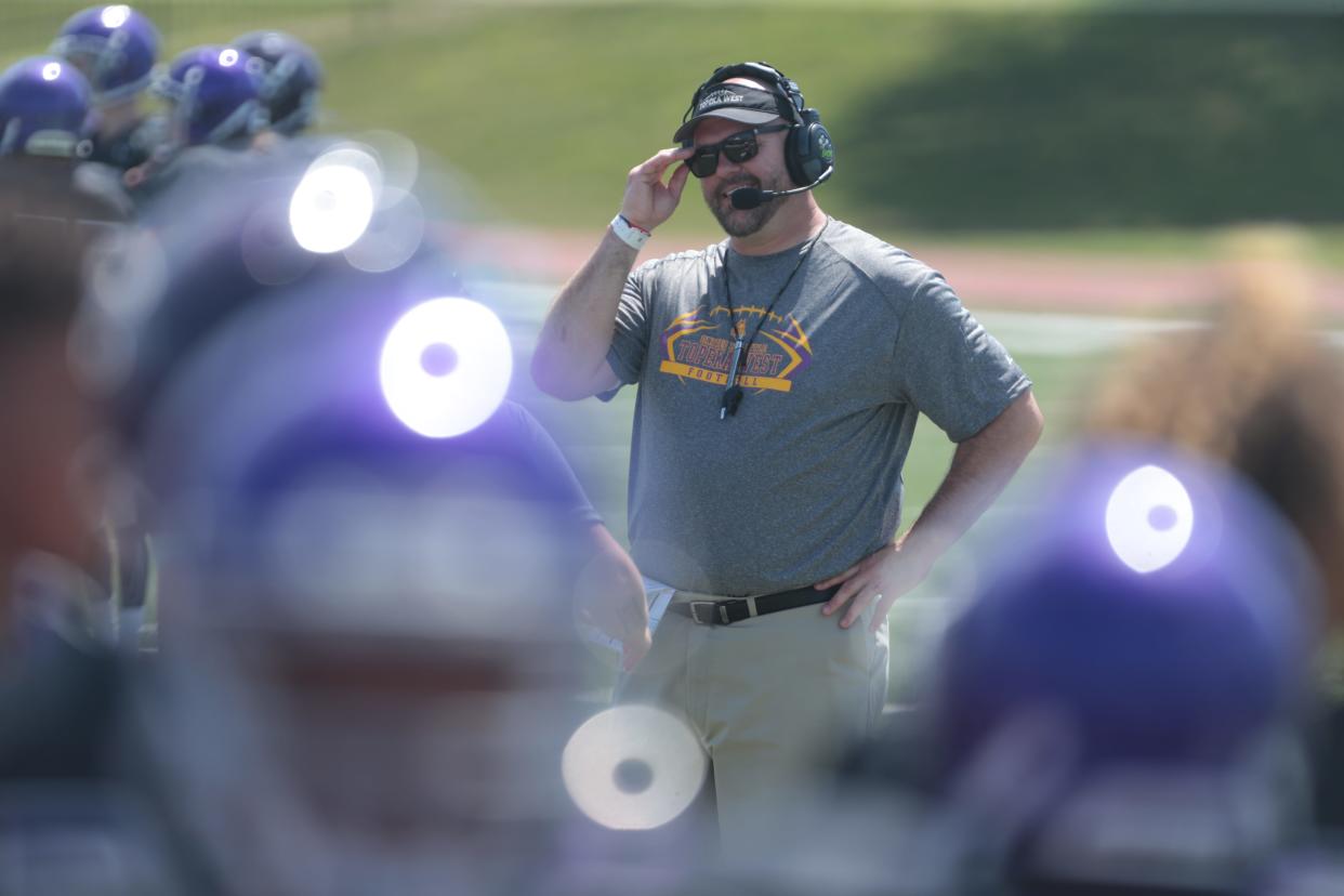 Topeka West football head coach Russell Norton was named the GM of the Topeka Tropics in April.