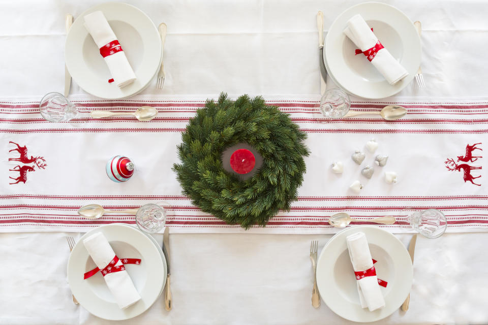 Consider a table runner, napkins and napkin holders/rings when setting your Christmas table this year. (Getty Images)