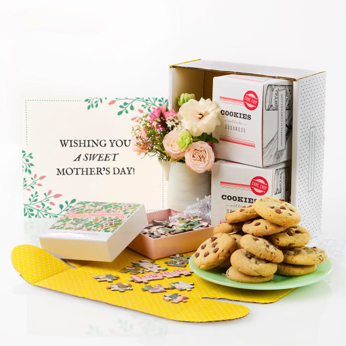 <p><a href="https://go.redirectingat.com?id=74968X1596630&url=https%3A%2F%2Fwww.spoonfulofcomfort.com%2Fproducts%2Fmothers-day-cookie-package&sref=https%3A%2F%2Fwww.countryliving.com%2Fshopping%2Fgifts%2Fg60719267%2Fmothers-day-gifts-for-friends%2F" rel="nofollow noopener" target="_blank" data-ylk="slk:Shop Now;elm:context_link;itc:0;sec:content-canvas" class="link rapid-noclick-resp">Shop Now</a></p><p>Mother's Day Cookie Package</p><p>spoonfulofcomfort.com</p><p>$49.99</p>