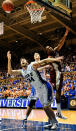 DURHAM, NC - JANUARY 21: Ryan Kelly #34 and Mason Plumlee #5 of the Duke Blue Devils fight for position with Michael Snaer #21 of the Florida State Seminoles as they battle for a rebound during play at Cameron Indoor Stadium on January 21, 2012 in Durham, North Carolina. Florida State won 76-73 to end Duke's 44-game home winning streak. (Photo by Grant Halverson/Getty Images)