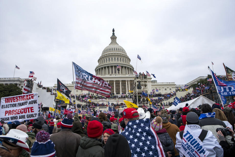 FILE - Insurrections loyal to President Donald Trump rally at the U.S. Capitol in Washington on Jan. 6, 2021. On Friday, Nov. 24, 2023, The Associated Press reported on stories circulating online incorrectly claiming security camera footage from Jan. 6, 2021, shows a federal agent disguised as a supporter of then-President Donald Trump during the attack on the U.S. Capitol. (AP Photo/Jose Luis Magana, File)