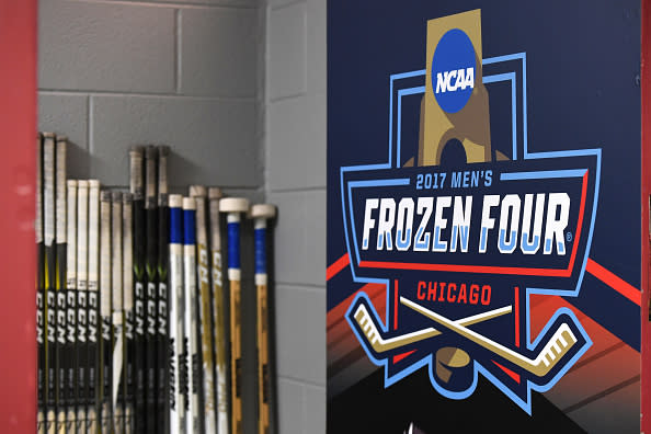 CHICAGO, IL – APRIL 06: A logo is seen on a door next to hockey sticks prior to an NCAA Frozen Four semifinal game with the Harvard Crimson and the Minnesota-Duluth Bulldogs on April 6, 2017, at the United Center in Chicago, IL. (Photo by Patrick Gorski/Icon Sportswire via Getty Images)