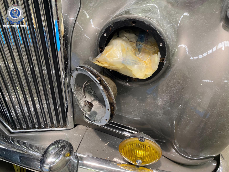 Drugs behind the headlight of a Bentley. 