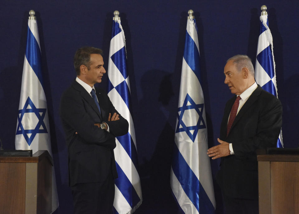 Israeli Prime Minister Benjamin Netanyahu, right, and Greek Prime Minister Kyriakos Mitsotakis give joint statements in Jerusalem, Tuesday, June 16, 2020. (Debbie Hill, UPI Pool via AP)