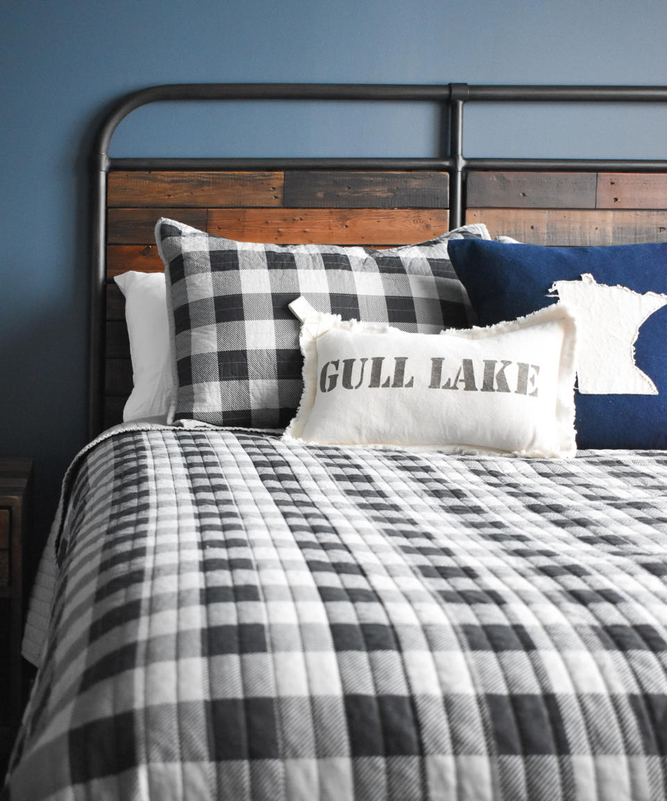 <p> Country style goes hand in hand with on-trend checks, bringing a wholesome, cottagecore look to any space. </p> <p> Forget the safe plain-plaid, this season checks are bigger, brighter, and bolder than ever before. Cheerfully hot-trotted from the summer catwalk into hunker-down homes, this rustic-ruffled pattern comes freshly delivered with a breezy, mischievous attitude - giving upholstery and everyday homeware a cheerful dollop of whimsical wholesomeness. Generational in appeal, and charming the socks off city and country-dwellers alike, chirpy-checks tick all the new-nostalgia ‘boxes’.    </p> <p> We love the combination of chunky mono check bedlinen, and farmhouse industrial bed in this rustic bedroom design - it's super cozy and inviting, just the thing for lazy weekend lie-ins...zzz... </p>