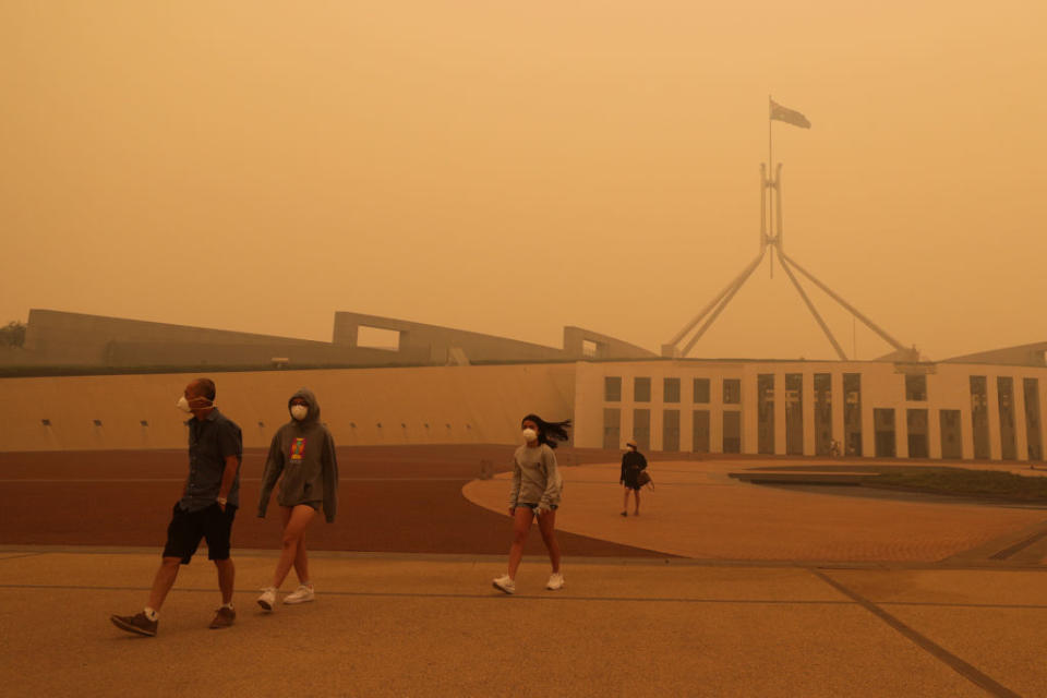 Visitors to Parliament House forced to wear face masks on Sunday. Source: Alex Ellinghausen/Getty