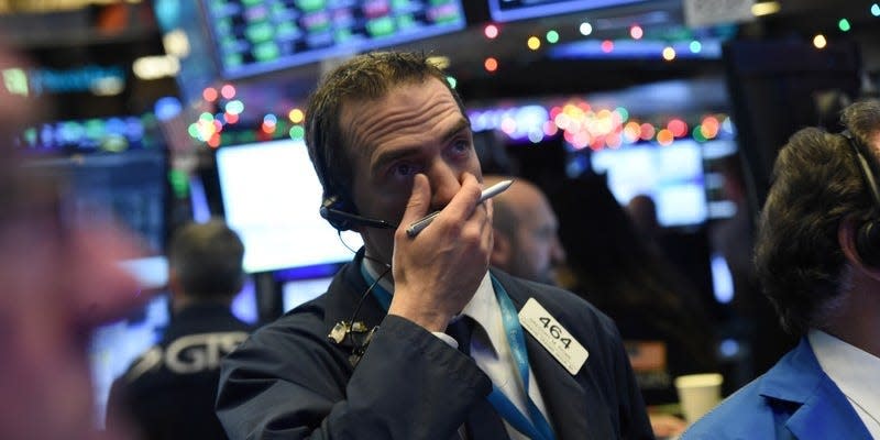 A trader looks on while waiting for the initial price of Tencent Music Entertainment company's IPO on the floor of the New York Stock Exchange (NYSE) in New York, U.S., December 12, 2018. REUTERS/Bryan R Smith