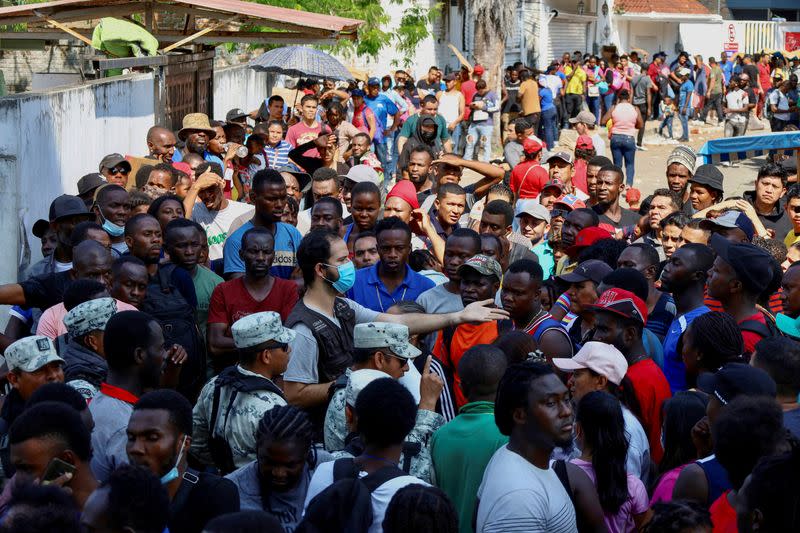 Migrants gather to regularize their migratory situation in COMAR, in Tapachula