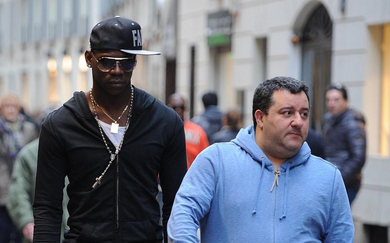 Agent Mino Raiola with Mario Balotelli, one of 51 clients on his books - Getty Images Europe