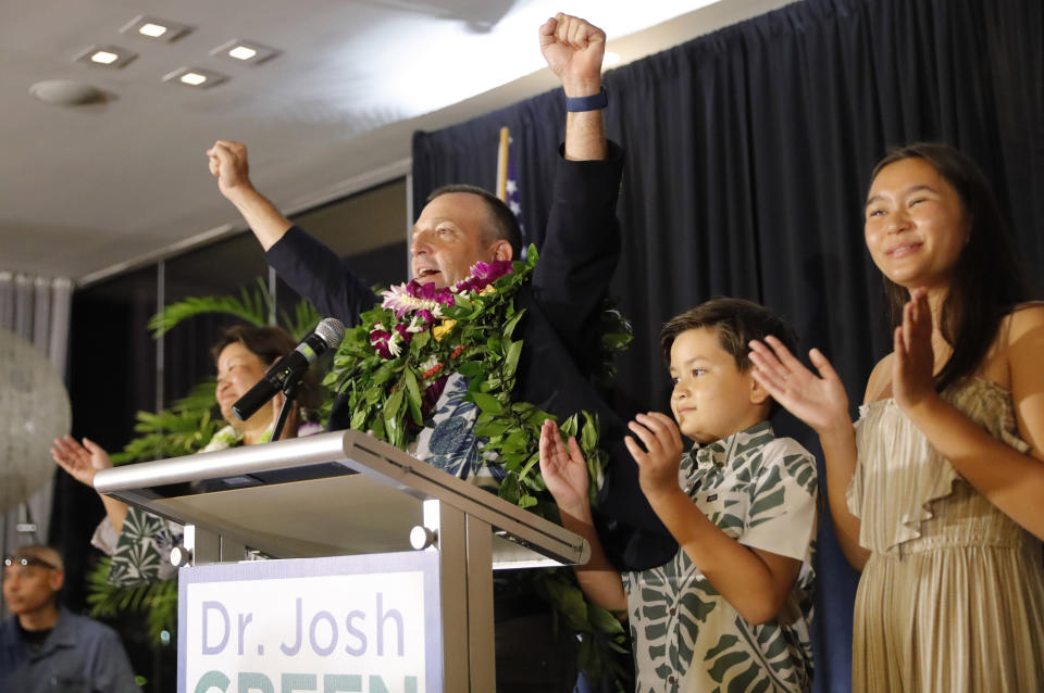 Democratic gubernatorial candidate Josh Green, center, celebrates at his campaign headquarters inside the Modern Hotel on Saturday, Aug. 13, 2022, in Honolulu. Lt. Gov. Green is the Democratic Party’s candidate to be Hawaii’s next governor. Green defeated U.S. Rep. Kaiali’i Kahele and former Hawaii first lady Vicky Cayetano in Saturday’s primary election. (Jamm Aquino/Honolulu Star-Advertiser via AP)