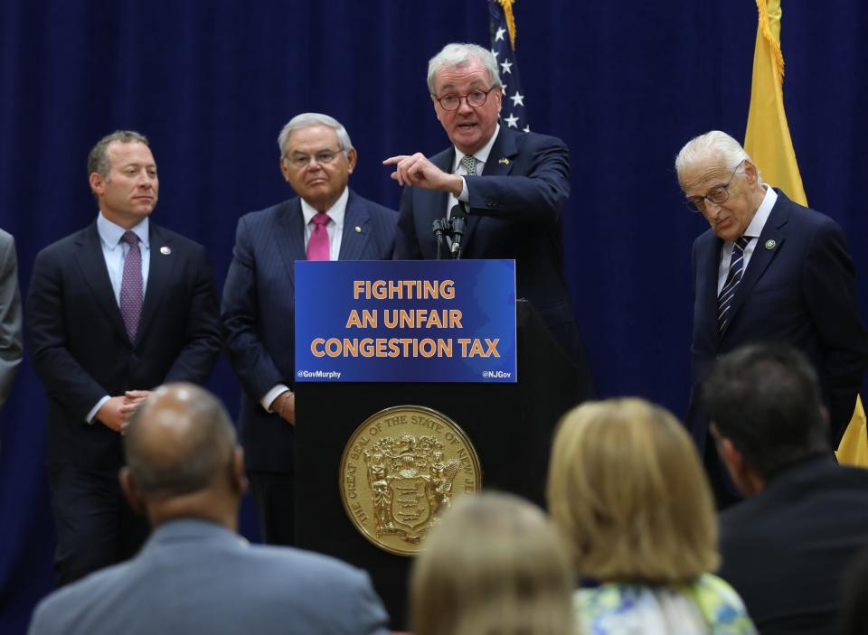 Nnj 716482
Fort Lee, NJ July 21, 2023 -- Rep. Josh Gottheimer, Sen. Robert Menendez, Gov. Phil Murphy and Rep. Bill Pascrell Jr. at a press conference to oppose NY’s congestion tax. Murphy and a delegation of politicians representing the Garden State came to Fort Lee to announce a lawsuit on New York's plan to impose a congestion tax.