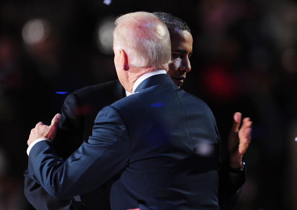 US Vice President Joe Biden hugs US President Barack Obama as they celebrate their victory on election night November 7, 2012 in Chicago, Illinois.    AFP PHOTO / Robyn Beck        (Photo credit should read ROBYN BECK/AFP/Getty Images)