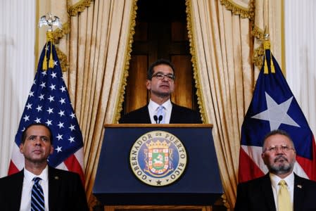 Pedro Pierluisi holds a news conference after swearing in as Governor of Puerto Rico in San Juan, Puerto Rico