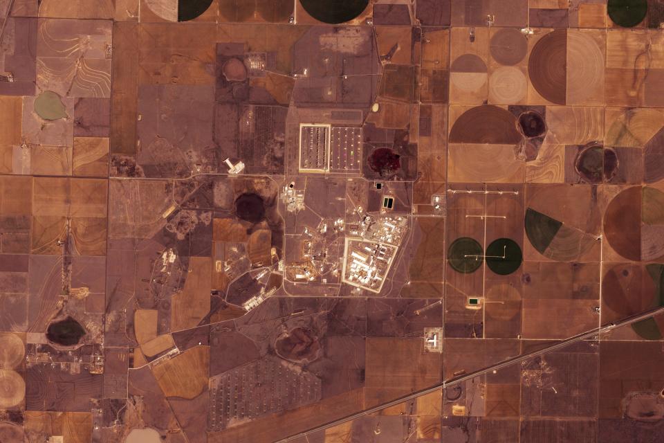 This satellite image from Planet Labs PBC shows the Pantex nuclear facility near Amarillo, Texas, Saturday, Feb. 24, 2024. Pantex, the main facility that assembles and disassembles America's nuclear arsenal shut down its operations Tuesday, Feb. 27, 2024, in Texas as fires raged out of control nearby. Pantex issued a statement online saying it had paused operations until further notice. (Planet Labs PBC via AP)