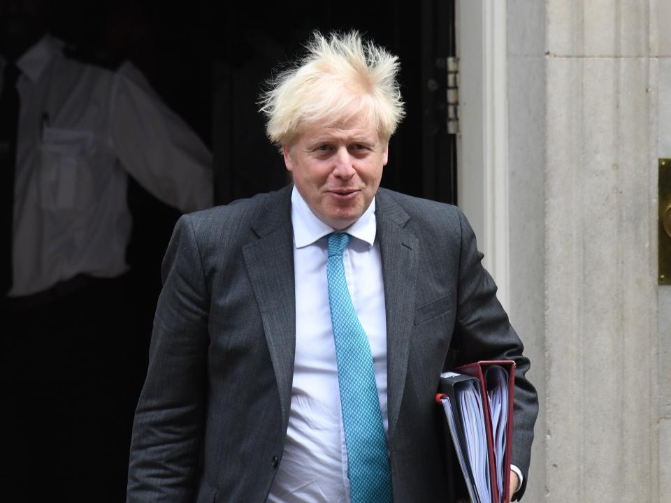 Britain’s prime minister Boris Johnson attends PMQs on Wednesday (EPA)