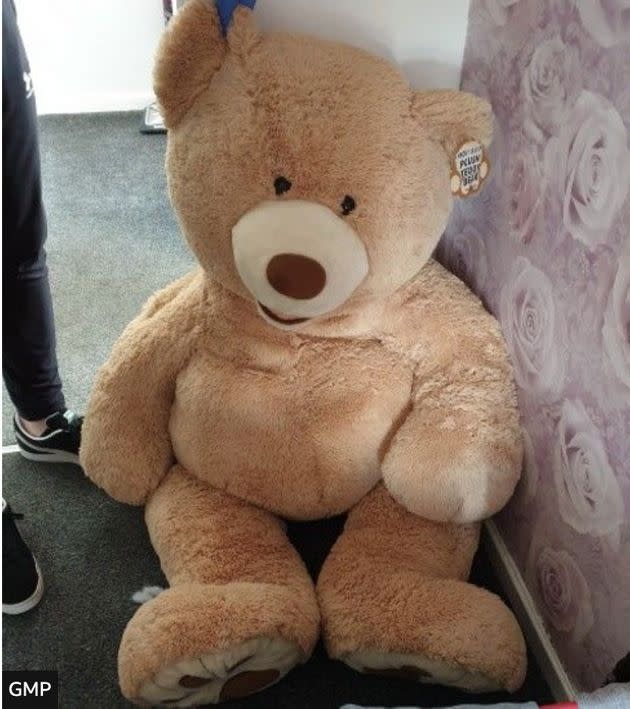 Police in Manchester, U.K., found suspected car thief Joshua Dobson hiding inside a giant teddy bear (Photo: Greater Manchester Police)