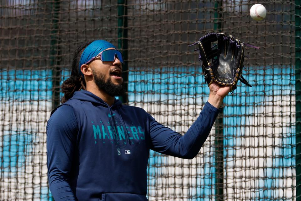 Seattle Mariners shortstop J.P. Crawford warms up before playing the Guardians, Friday, April 7, 2023, in Cleveland.