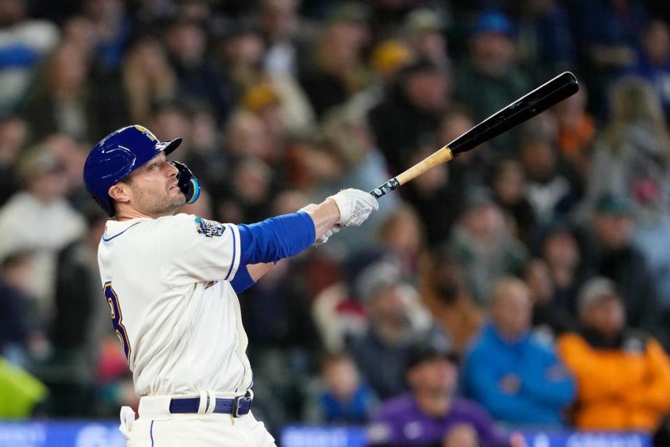 Seattle Mariners’ AJ Pollock follows through during an at-bat against the Colorado Rockies in a baseball game Sunday, April 16, 2023, in Seattle. (AP Photo/Lindsey Wasson)