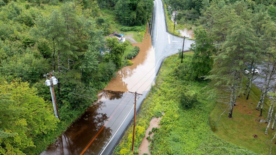 PHOTO: In an aerial view, water covers Route 11 after heavy rain on July 10, 2023 in Londonderry, Vt. (Scott Eisen/Getty Images)
