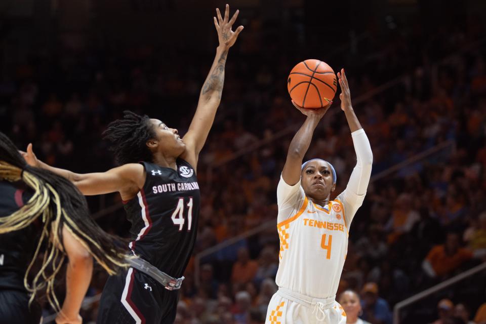 Tennessee guard Jordan Walker (4) attempts a shot past South Carolina guard Kierra Fletcher (41) during a NCAA college basketball game between the Tennessee Lady Vols and the South Carolina Gamecocks at Thompson-Boling Arena in Knoxville, Tenn. on Thursday, February 23, 2023. 