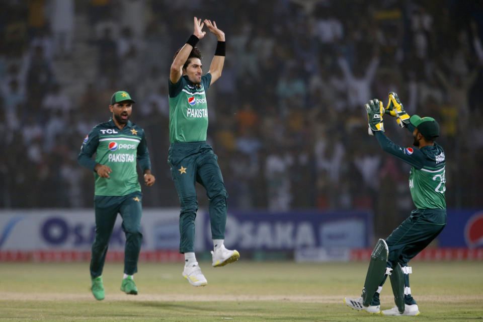 Pakistan's Mohammad Wasim, center, celebrates with teammates after taking the wicket of West Indies' Shamarh Brooks during the third one day international cricket match between Pakistan and West Indies at the Multan Cricket Stadium, in Multan, Pakistan, Sunday, June 12, 2022. (AP Photo/Anjum Naveed)