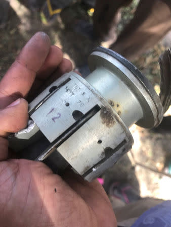 The remnants of a rocket is seen in Nzuruwei village, after herdsmen and Nigeria’s air force attacked the village on December 4 in Adamawa state, Nigeria December 13, 2017. Picture taken December 13, 2017. Amnesty International/Handout via REUTERS