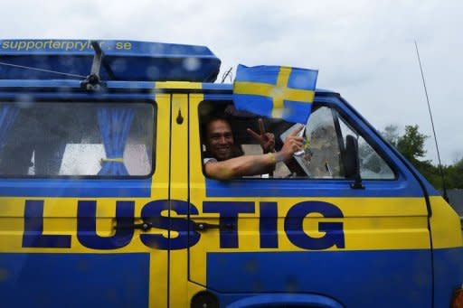 Swedish fans from "Camp Lustig" drive to "Camp Sweden" in Kiev during the Euro 2012. Swedish football fans are prepared to live in near-primitive conditions so as to get a chance of seeing the Swedish team in action
