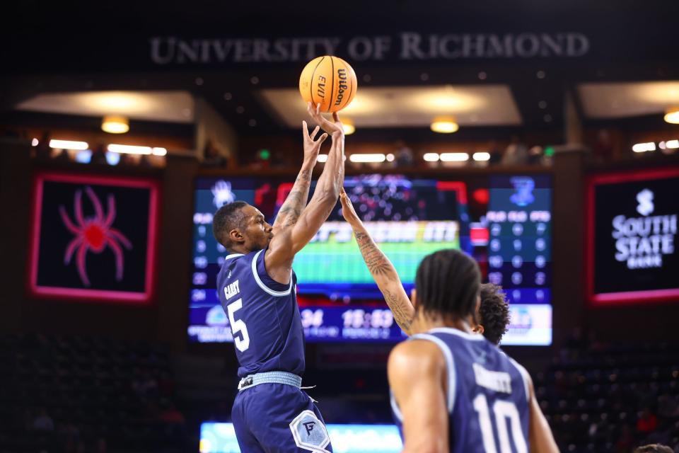 URI's Jalen Carey goes up for a shot on Tuesday night against Richmond. 1/17/23