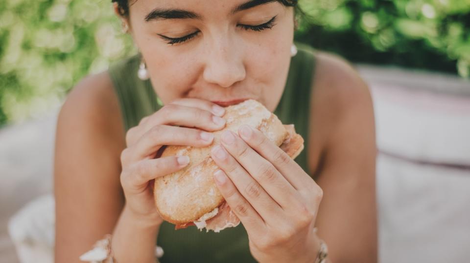 Woman eating a sandwich