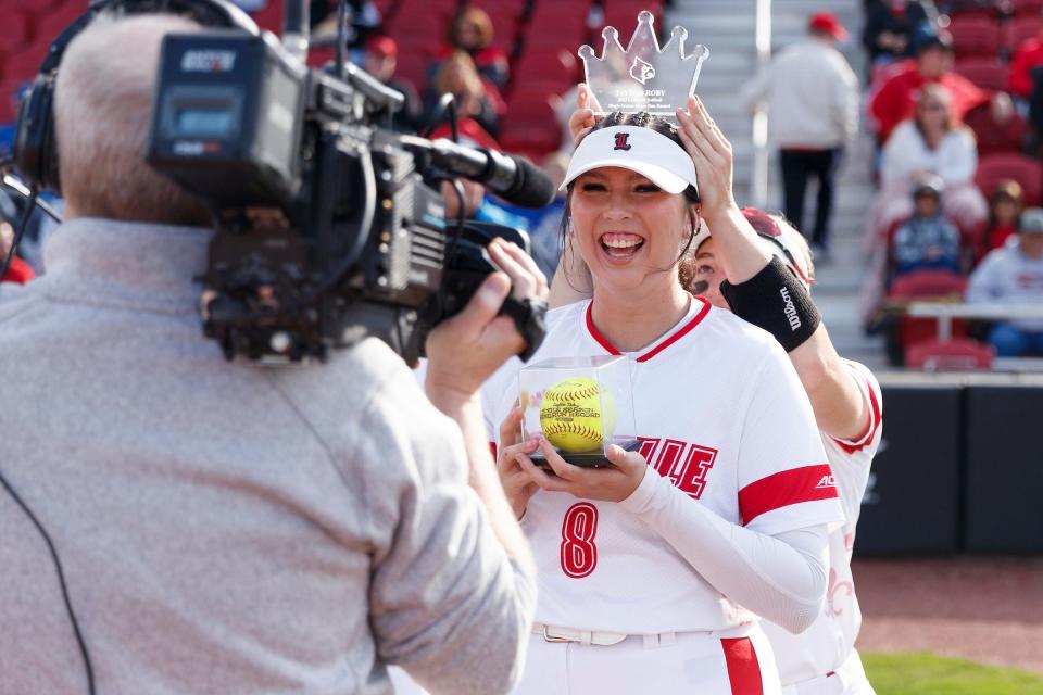 Taylor Roby smiles and poses for the camera after a Louisville softball game against Boston College on April 28, 2023, at Ulmer Stadium in Louisville, Ky. Roby holds the program's single-season record for home runs with 22 and counting heading into the NCAA tournament.