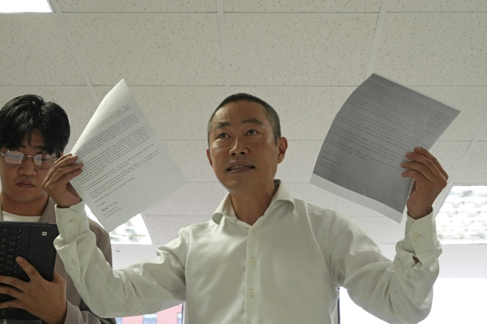 Peter Møller, attorney and co-founder of the Danish Korean Rights Group, speaks to the media at the Truth and Reconciliation Commission in Seoul, South Korea, Tuesday, Sept. 13, 2022. Nearly 300 South Koreans who were adopted to European and American parents as children have so far filed applications demanding South Korea’s government to investigate their adoptions, which they suspect were based on falsified documents that laundered their real status or identities as agencies raced to export children. (AP Photo/Ahn Young-joon)