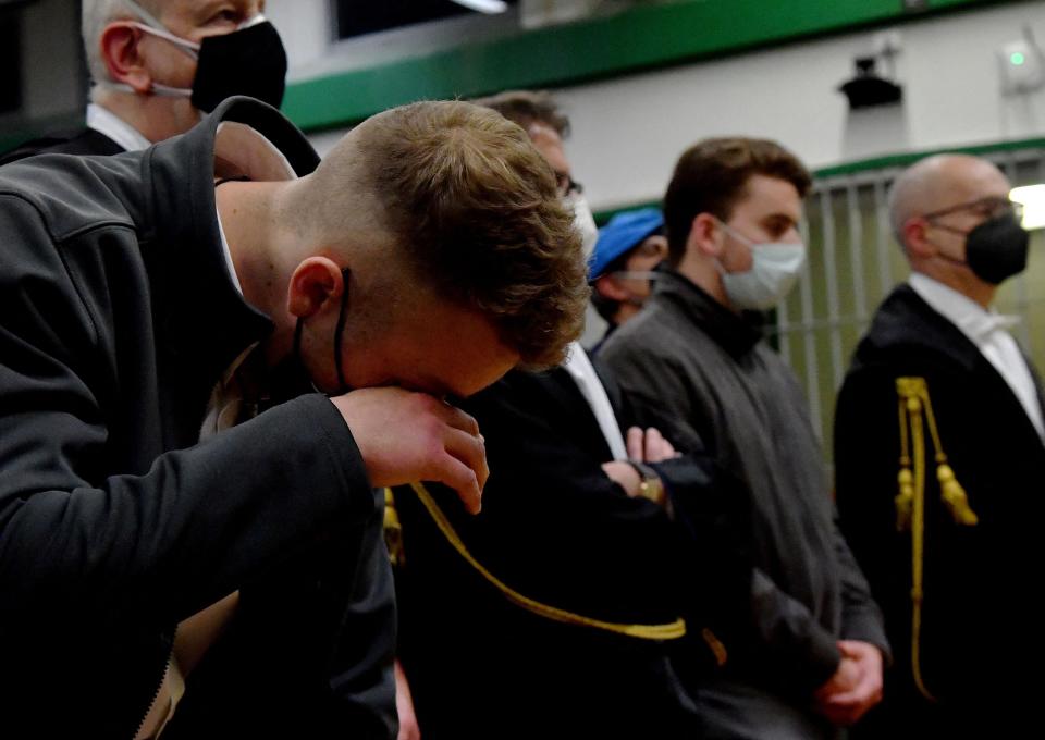 Finnegan Lee Elder and Gabriel Natale-Hjorth react to the guilty verdict (AFP via Getty Images)