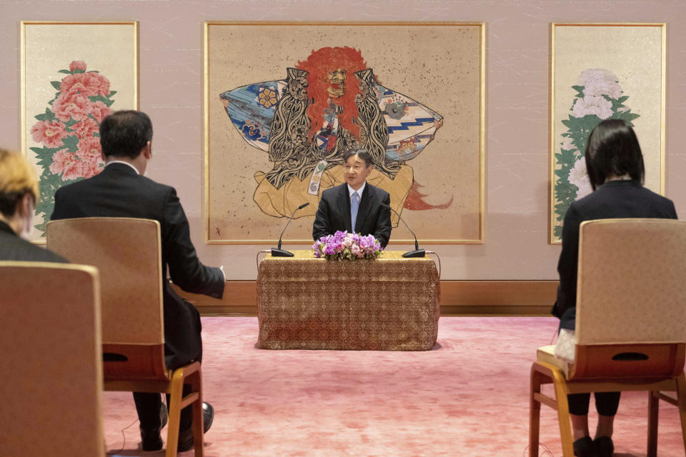 Japan's Emperor Naruhito, center, attends a press conference at the Imperial Palace in Tokyo Thursday, June 15, 2023, ahead of his planned visit to Indonesia. The June 17-23 trip comes after Indonesia's president invited the couple during his visit to Tokyo in 2022. (Yuichi Yamazaki/Pool Photo via AP)