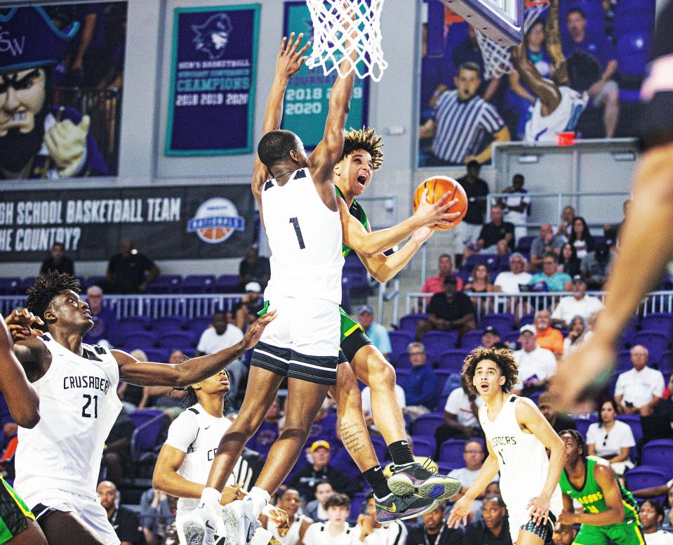 AZ Compass PrepÕs Jordan Ross goes up for a basket during the GEICO High School Nationals quarterfinal game against Long Island Lutheran at Suncoast Credit Union Arena on Thursday. AZ Compass won.  