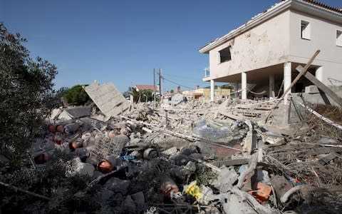 General view of the debris of a house after it completely collapsed after a gas leak explosion in a real state in the village of Alcanar, Catalonia, northeastern Spain, 17 August 2017 - Credit: EPA/JAUME SELLART