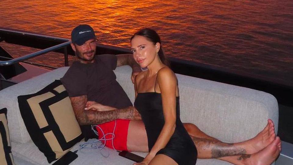 David and Victoria Beckham chilling at sunset 