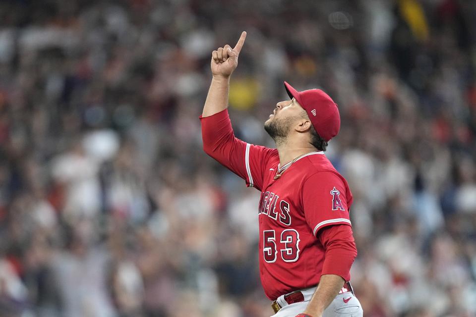 Los Angeles Angels' Carlos Estevez celebrates after a baseball game against the Houston Astros Sunday, June 4, 2023, in Houston. The Angels won 2-1. (AP Photo/David J. Phillip)