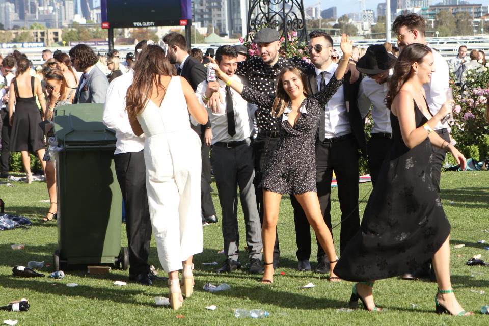 <p>Revellers at the end of a long Derby Day. </p>