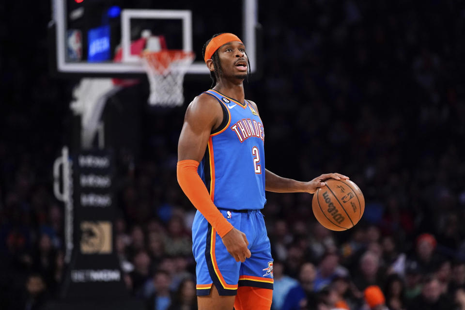 Oklahoma City Thunder guard Shai Gilgeous-Alexander (2) dribbles the ball during the second half of an NBA basketball game against the New York Knicks, Sunday, Nov. 13, 2022, in New York. The Thunder won 145-135. (AP Photo/Julia Nikhinson)