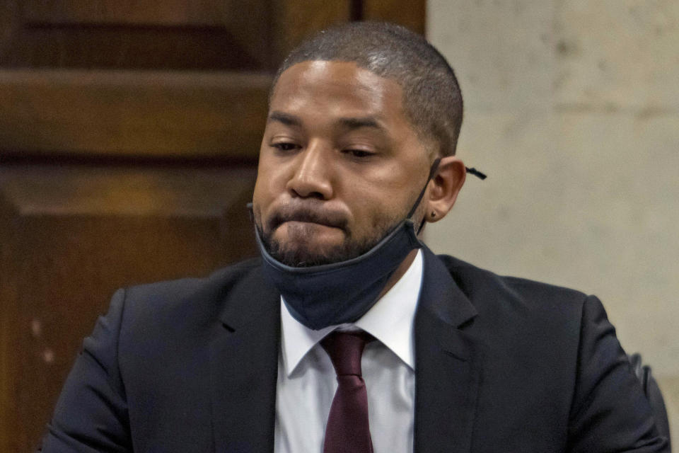 FILE _ Actor Jussie Smollett listens as his sentence is read at the Leighton Criminal Court Building, Thursday, March 10, 2022, in Chicago. An appeals court on Friday, Dec. 1, 2023, upheld the disorderly conduct convictions of actor Jussie Smollett, who was accused of staging a racist, homophobic attack against himself in 2019 and then lying about it to Chicago police. (Brian Cassella/Chicago Tribune via AP, Pool)