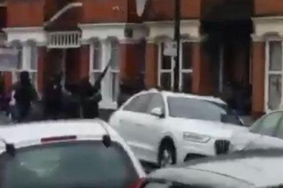 Terror raid: Police shoot at windows during the raid in Willesden: Twitter/@kieranmckenna1