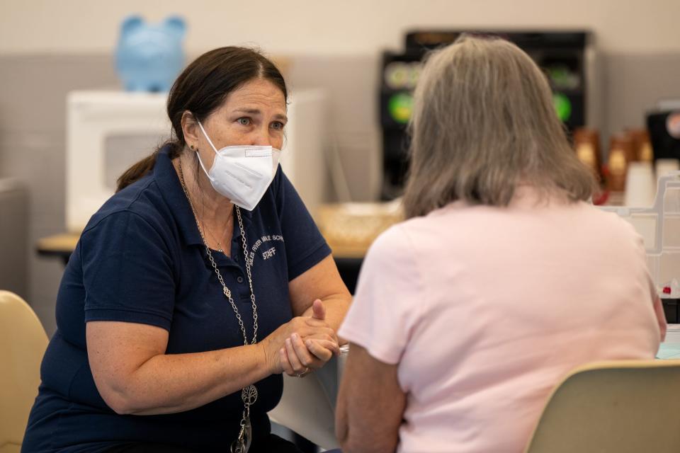 Wenham, Mass., Public Nurse Mari Beth Ting prepares a patient to receive the COVID-19 vaccine at a senior center. Vaccinations are down though they are still necessary for society to protect medically vulnerable people, including senior citizens.