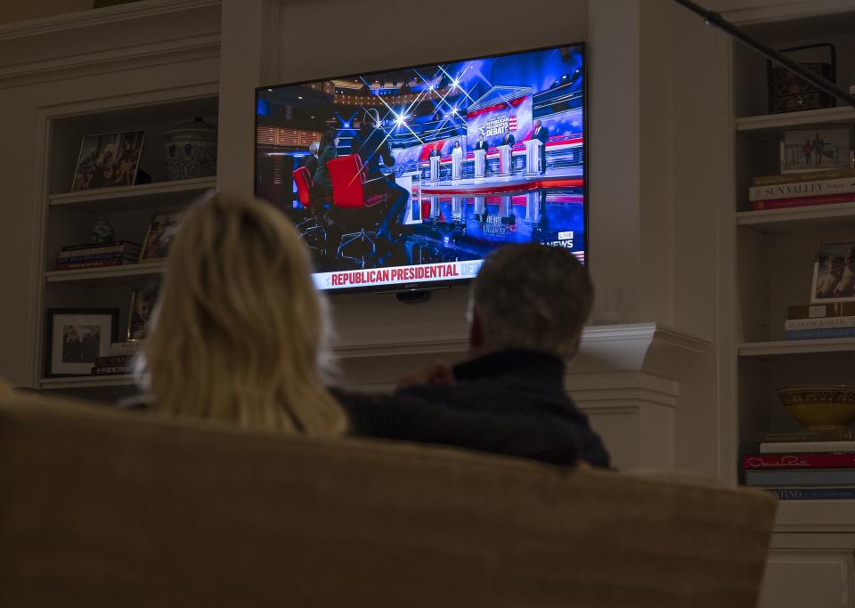 Jon Hunstman Jr. and his wife Mary Kaye watch the GOP presidential debate at their Salt Lake City home on Wednesday, Nov. 8, 2023. | Laura Seitz, Deseret News