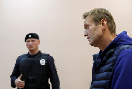 Russian opposition leader Alexei Navalny, who was detained over allegations of staging illegal protests, attends a court hearing in Moscow, Russia September 24, 2018. REUTERS/Maxim Shemetov