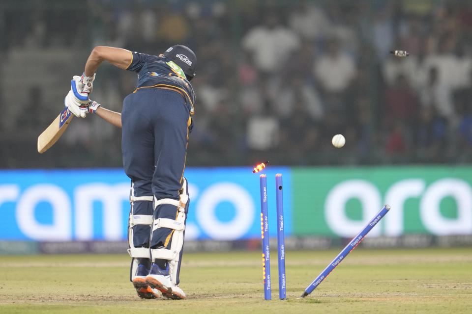 Gujarat Titans' Shubman Gill is bowled out during the Indian Premier League (IPL) cricket match between Delhi Capitals and Gujarat Titans in New Delhi, India, Tuesday, April 4, 2023. (AP Photo/Manish Swarup)