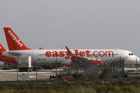 Aircraft of British carrier easyJet parked on the apron at Larnaca airport, Cyprus November 7, 2015. REUTERS/Yiannis Kourtoglou