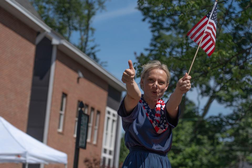 Rep. Victoria Spartz, shown waving during the 2022 CarmelFest in Carmel, has decided to run for reelection after previously saying she wouldn't.